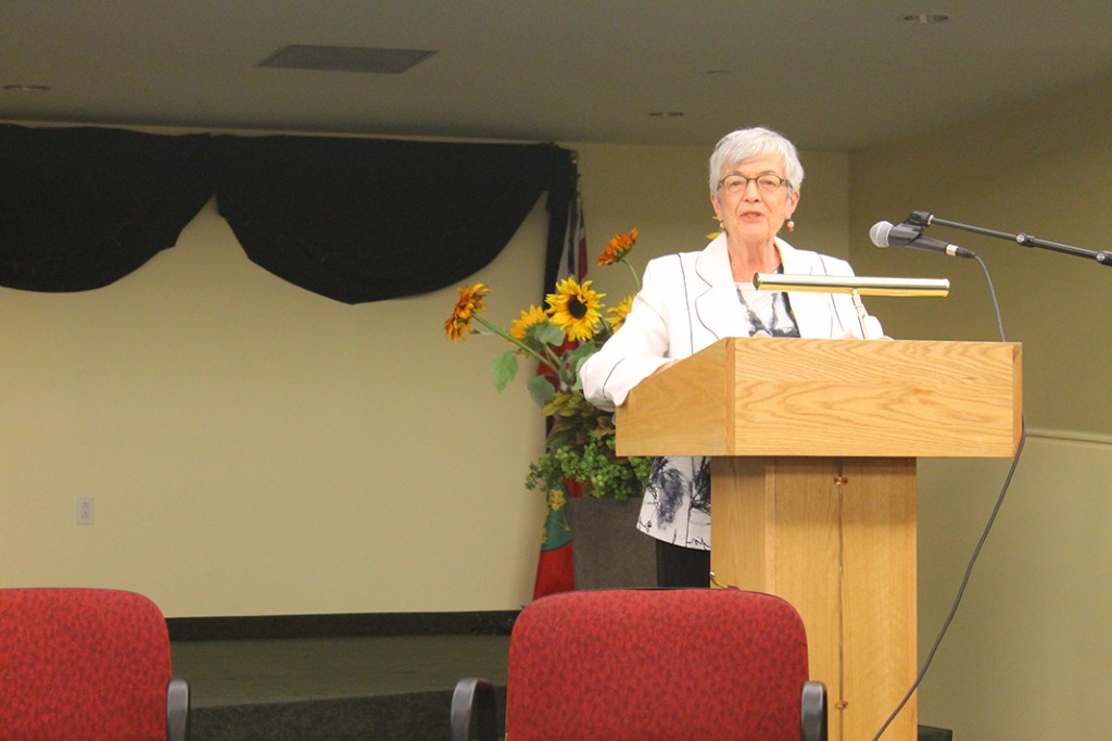 Ann speaking at Carolyn Bennett's Town Hall.
